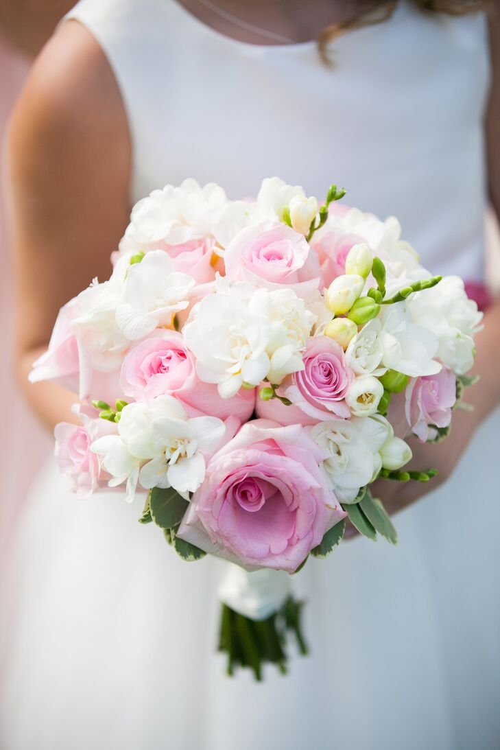 Lindsay's bridal bouquet was girly and sweet with pale pink roses and white hydrangeas.