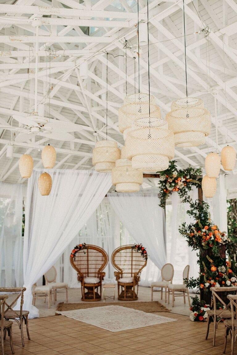 Boho ceremony space with woven chandeliers