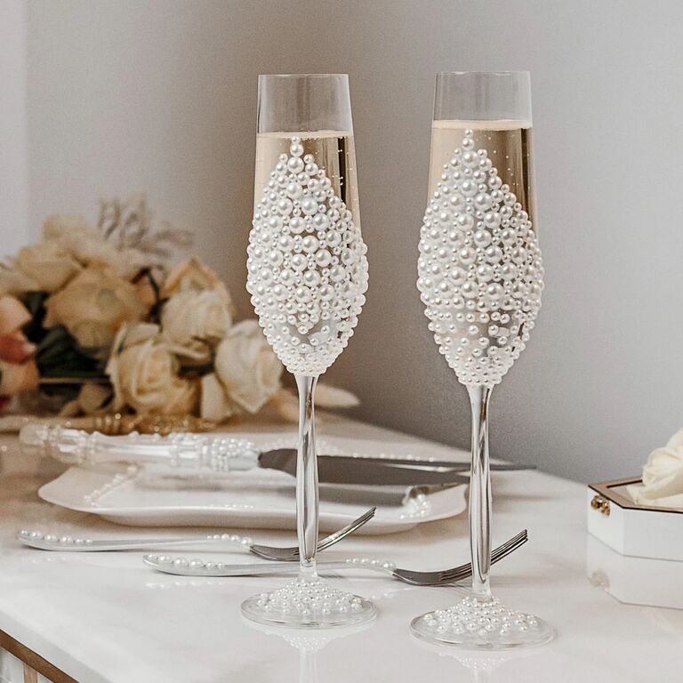 vintage inspired wedding champagne flutes decorated with pearl embellishments