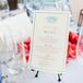 All of Kendall and Greg's stationery included an original illustration of two Adirondack chairs overlooking the ocean designed by Serendipity Beyond Design.