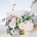 Samantha carried a lush bouquet of sweet pea, foxglove, larkspur, Queen Anne’s lace, bells of Ireland, bee balm, lavender, scabiosa and roses.