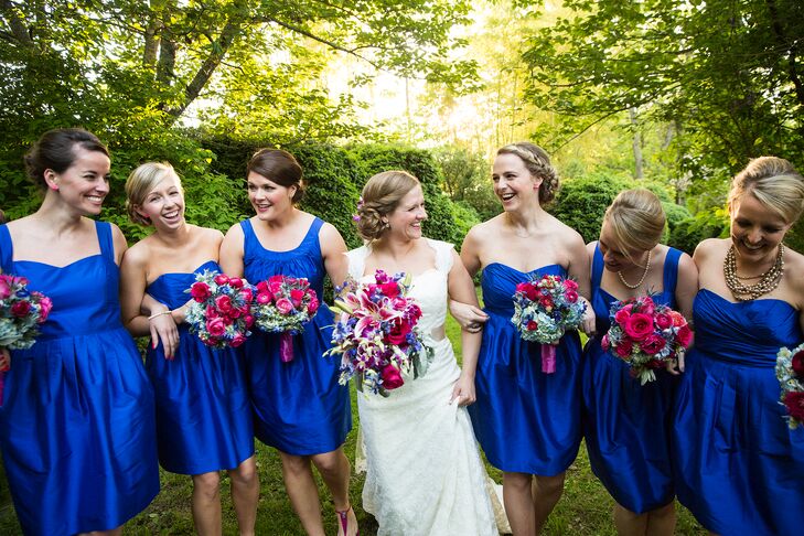 The bridesmaid dresses and shoes set the tone for their vibrant color palette—bright cobalt dresses by LuluKaternand raspberry Michael Kors sandals.