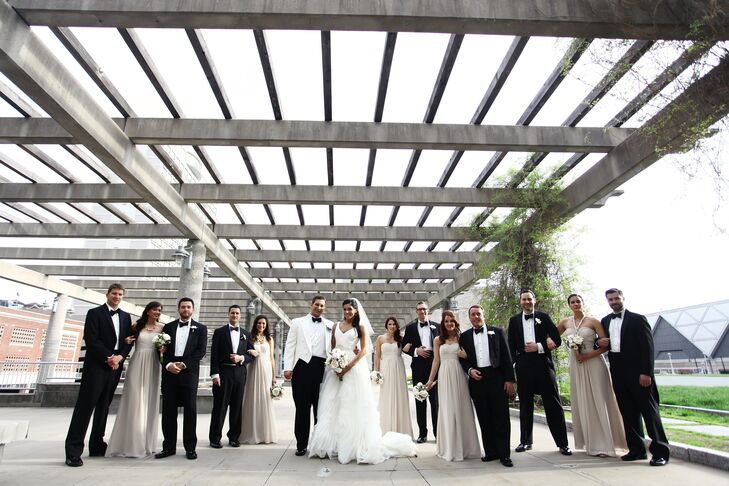 The bridesmaids wore floor-length champagne chiffon dresses and the groomsmen wore classic tuxedos from Tip Top Tux in Leawood, Kansas.