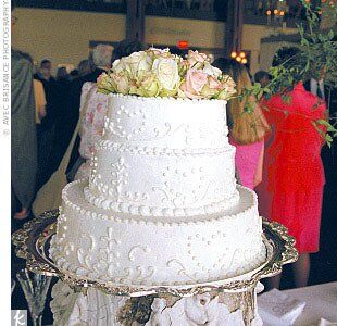 Suzanne and Jack served a white chiffon cake with raspberry-mousse filling and white buttercream icing.