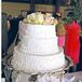 Suzanne and Jack served a white chiffon cake with raspberry-mousse filling and white buttercream icing.