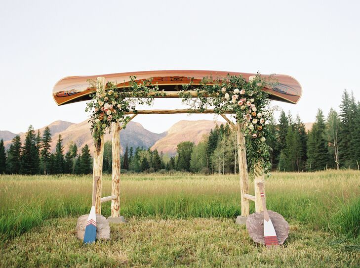 "We were married under a custom arbor of a canoe crafted by one of northern Montana’s most well-known canoe builders, Morley Canoes," the bride says.