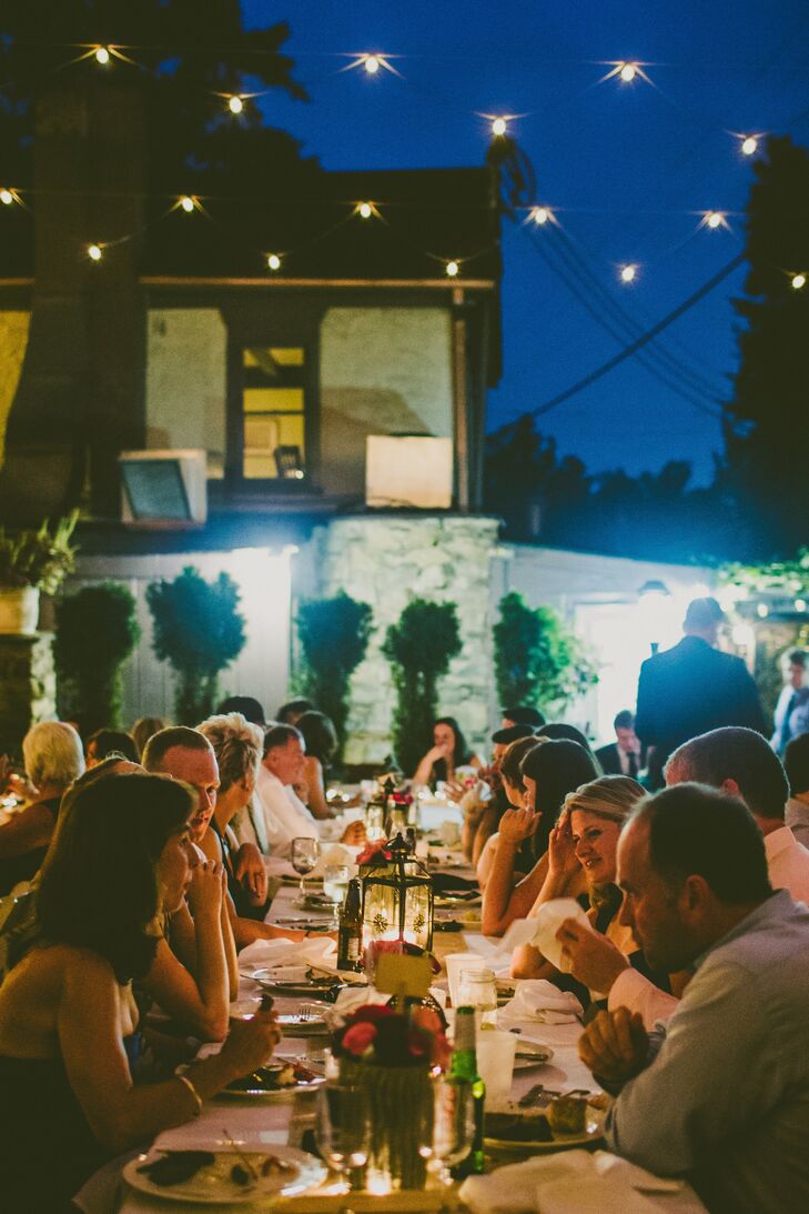 Guests ate dinner by candlelight on the patio at Old Anglers. LED twinkle lights also illuminated the space from above.