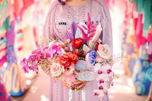 Bride in Purple Wedding Dress Holding Colorful Bouquet