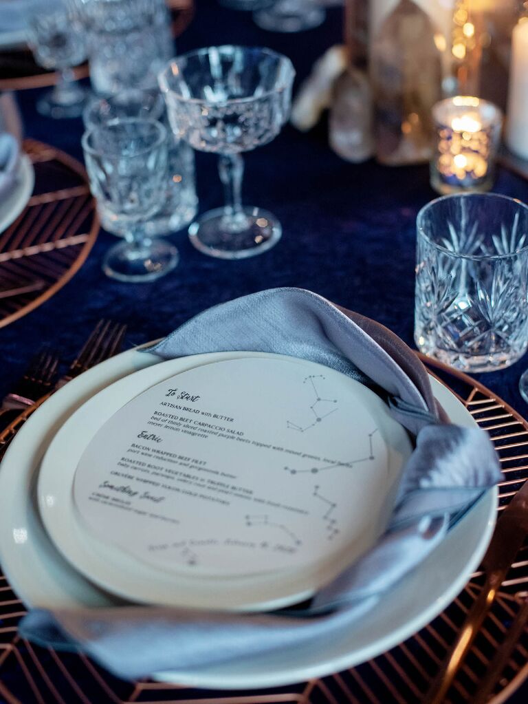 Constellation-printed menu at celestial wedding reception
