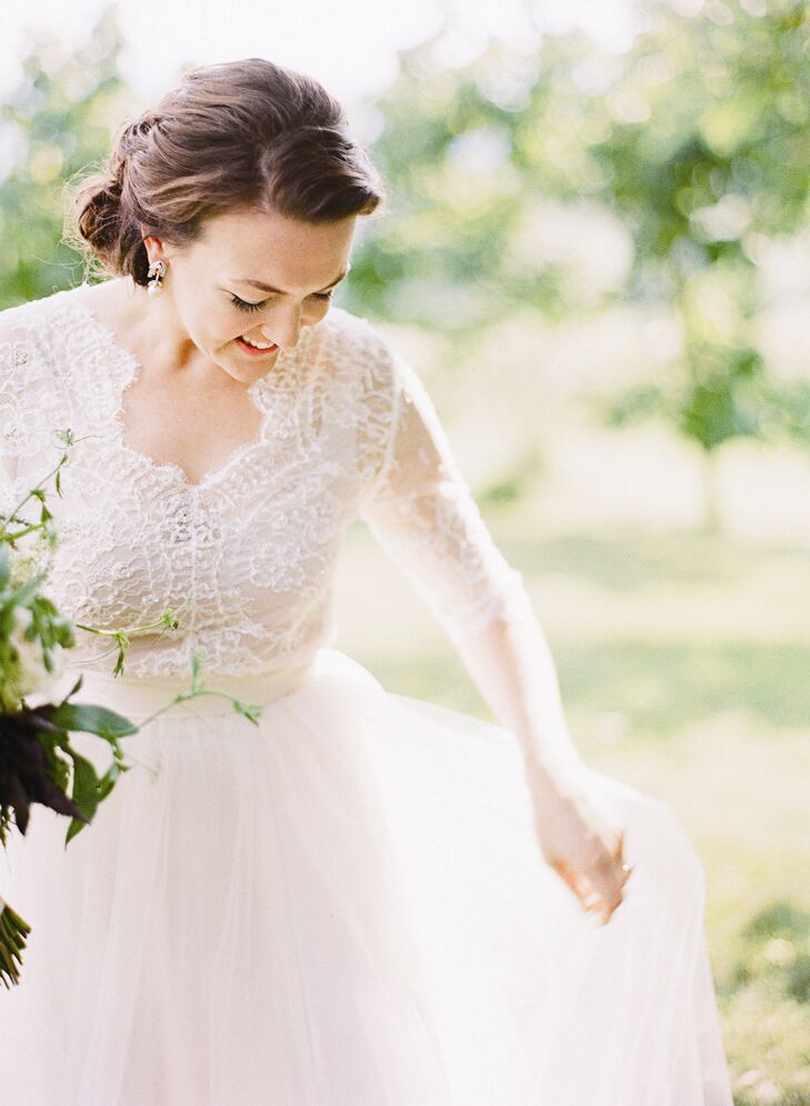Augusta worked closely with designer Emily Riggs to create a custom variation on her Claire gown. Her dress was a one-of-a-kind two-piece, with a delicate lace top and a full tulle skirt.