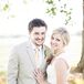 Krysten went with a classic ivory lace gown, while Lucas chose a khaki suit.