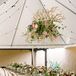 Tented Reception with Wood and Floral Chandelier Installation