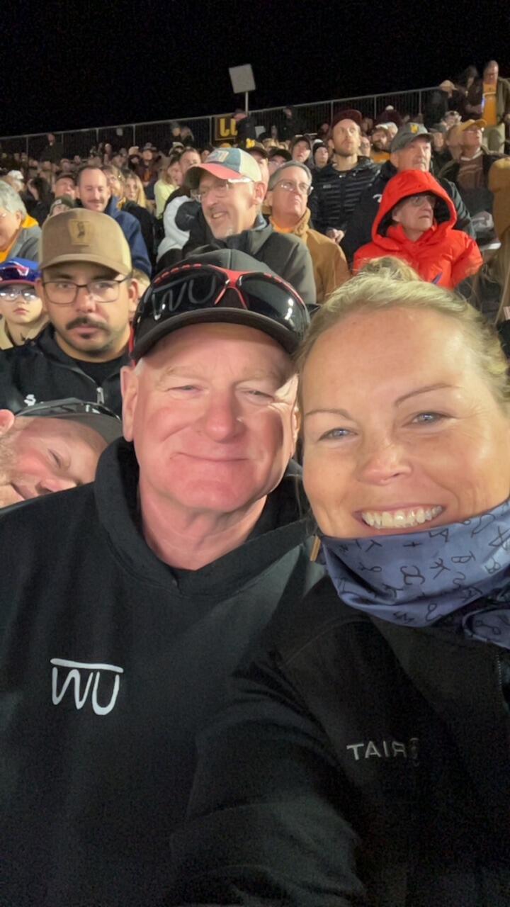 Enjoying a UW-Laramie Cowboys football game as a newly engaged couple!