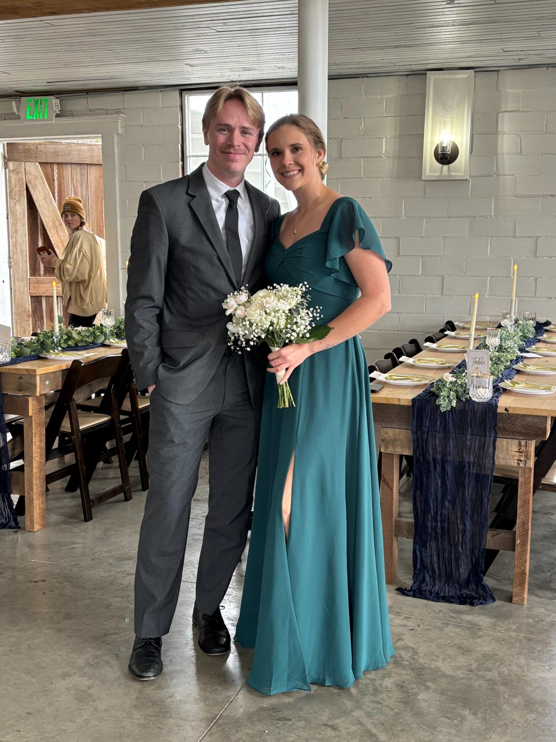 Our first picture together at Abby's sister's wedding! 