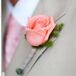 Shaun and his groomsmen perfectly fit the formality of the wedding in tan linen suits from Banana Republic. The groomsmen wore pink shirts with brown ties while Shaun wore a white shirt with a pink tie and a pink rose boutonniere.