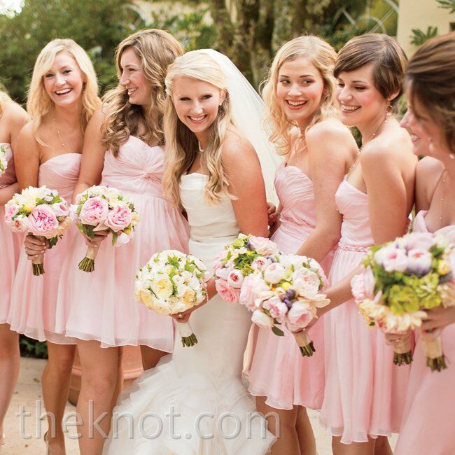 The pale-pink hue of the bridesmaids’ silk chiffon dresses led the day’s palette