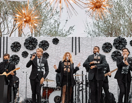 Live band performing top 100 love songs for wedding.