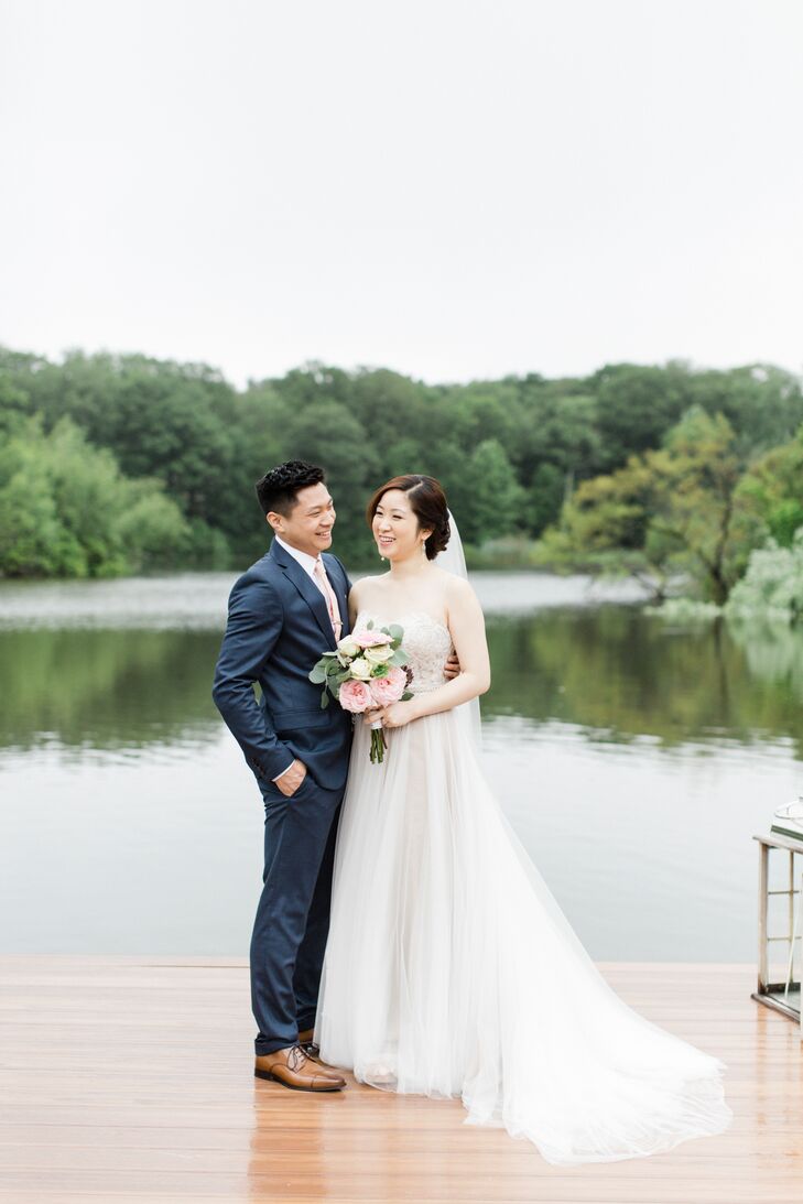 After two months of searching for the ideal venue, Priscilla and Daniel found their spot: Rock Island Lake Club in Sparta, New Jersey. They loved the lakeside ceremony space and having everything in one central location. “An extra plus is that it was hidden a little higher up in the hills,” Priscilla says. "Also, being next to the lake meant it wouldn’t be very hot. It was what we wanted and even though the drive was over an hour, it was all worth it.”