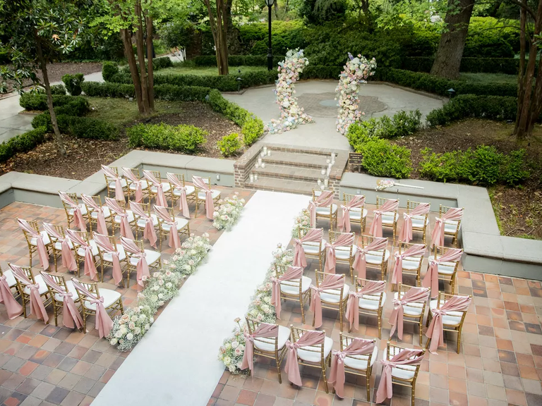 These wedding pillars present a modern floral alternative to a wedding arch.
