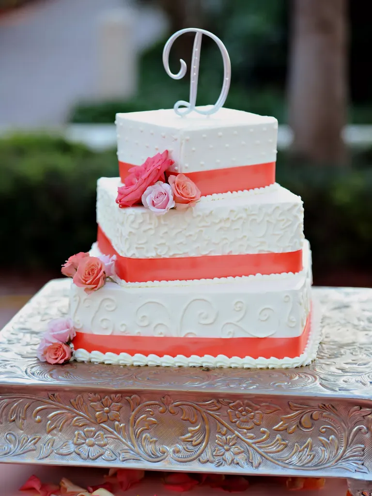 Three-tiered Square Wedding Cake with Coral Accents