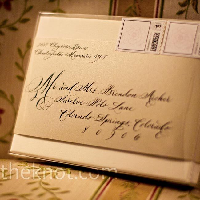 Each invitation box included champagne and ivory metallic stock cards and was marked with custom peony stamps.