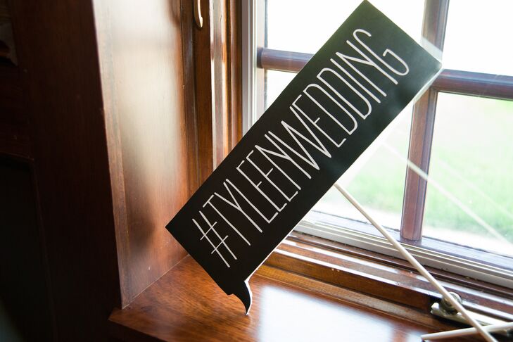 Eileen and Tyler made the most of their "couple name" with fun, personalized photo props.