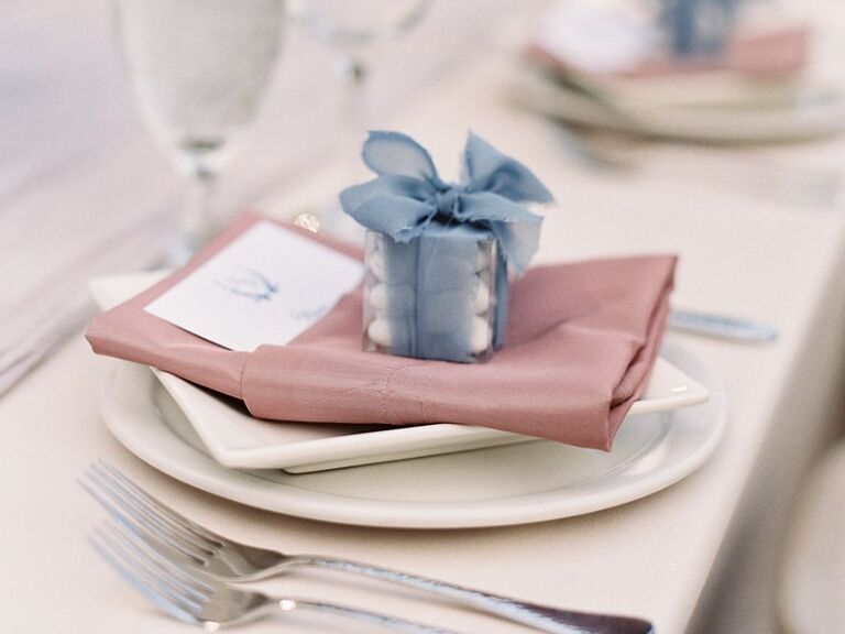 wedding favors wrapped in blue ribbon