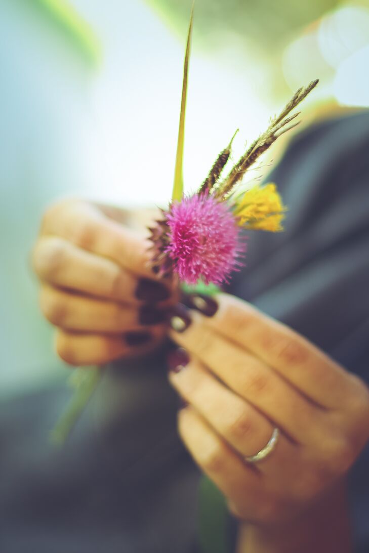 Since the groomsmen attire was brown, Kelsey and Joey added a pop of color to the look with simple purple and yellow wildflowers. The bridesmaids arranged all the boutonnieres themselves, picking them from the property in Meeker, Colorado, the day before.