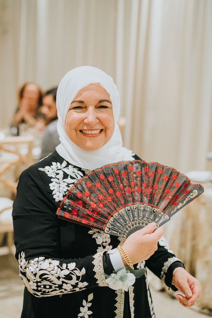Wedding Guest With Fan
