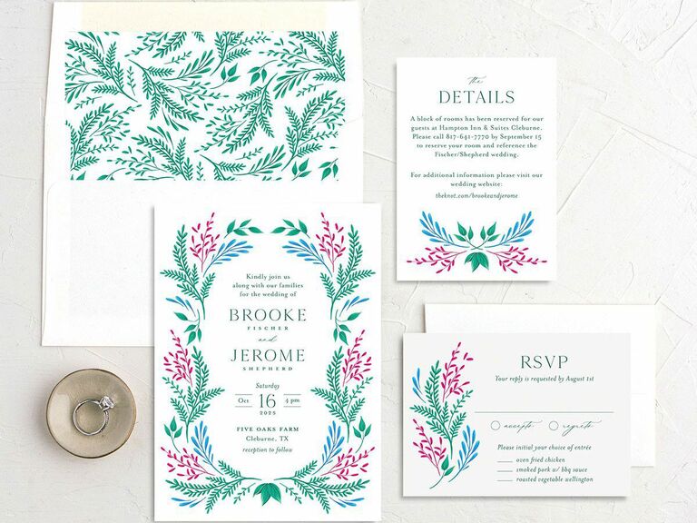 Rustic floral wedding invitation suite ready for mailing