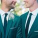 Grooms in Chic, Matching Emerald Green Suits With Gold Buttons