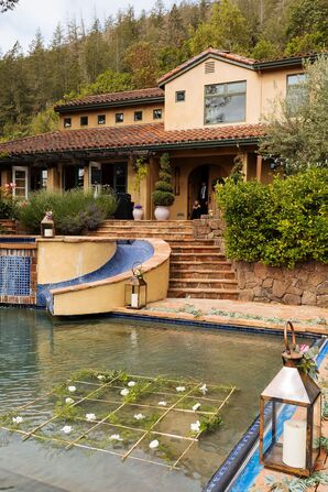 Floral Sugarcane Grids Floating in Pool of Private Estate at Interfaith Wedding
