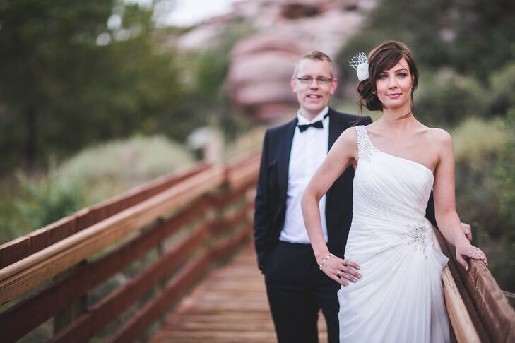 Miri wore a one-shoulder sheath style wedding dress with a beaded hip embellishment and white fascinator.