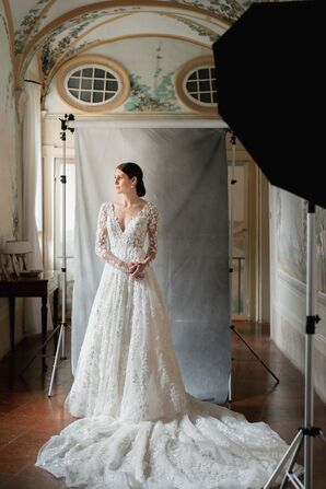 Bride in Long-Sleeve Justin Alexander Wedding Dress