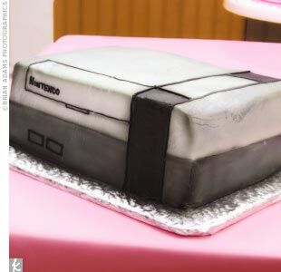 Mike is a big fan of Nintendo, so Whitney arranged for a groom’s cake created to look like an original Nintendo system.