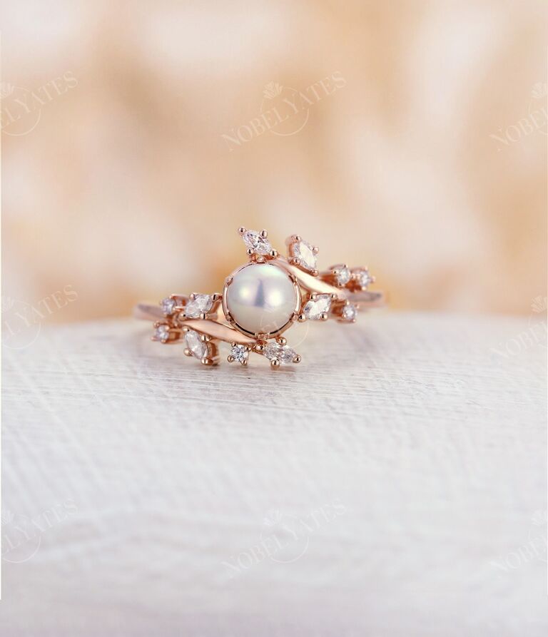 Vintage pearl and diamond cluster engagement ring from NyFineJewelry