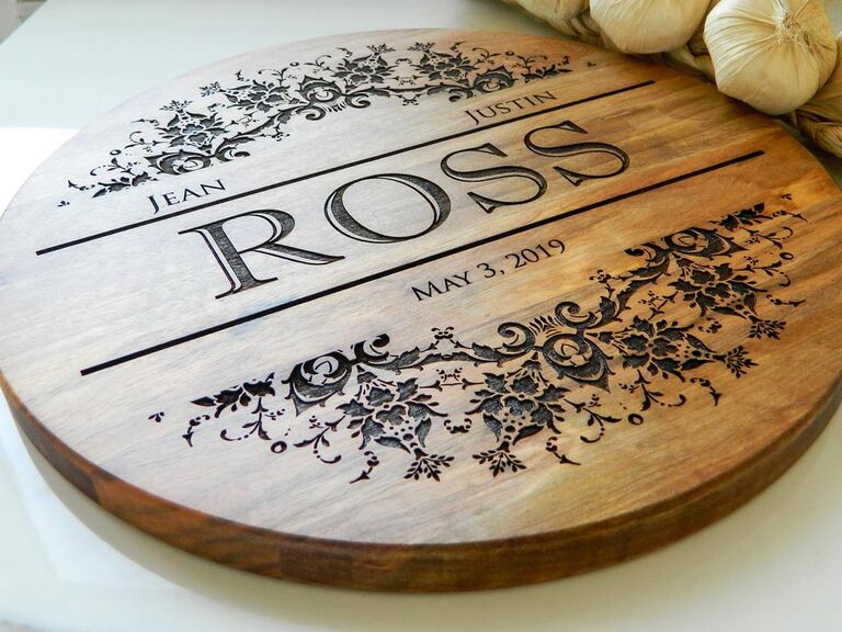 Engraved round wooden wedding cake board