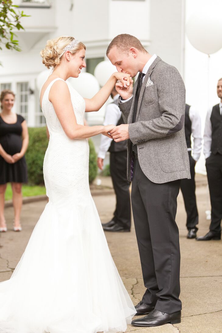 This elegant, classic wedding was inspired by a love for old-world design in a black and white palette, from the striped wrap around the stems of the 