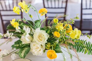 Modern Centerpiece of Yellow Ranunculus, Daffodils, Roses and Ferns