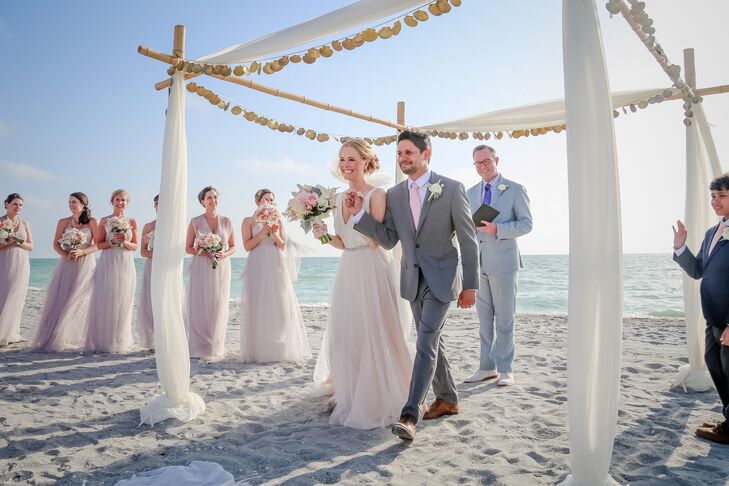 Lindsey wasn’t the only one who wanted to wear pink. George picked out a slim-fit heather Hugo Boss gray suit with a striped pink tie and white shirt.
