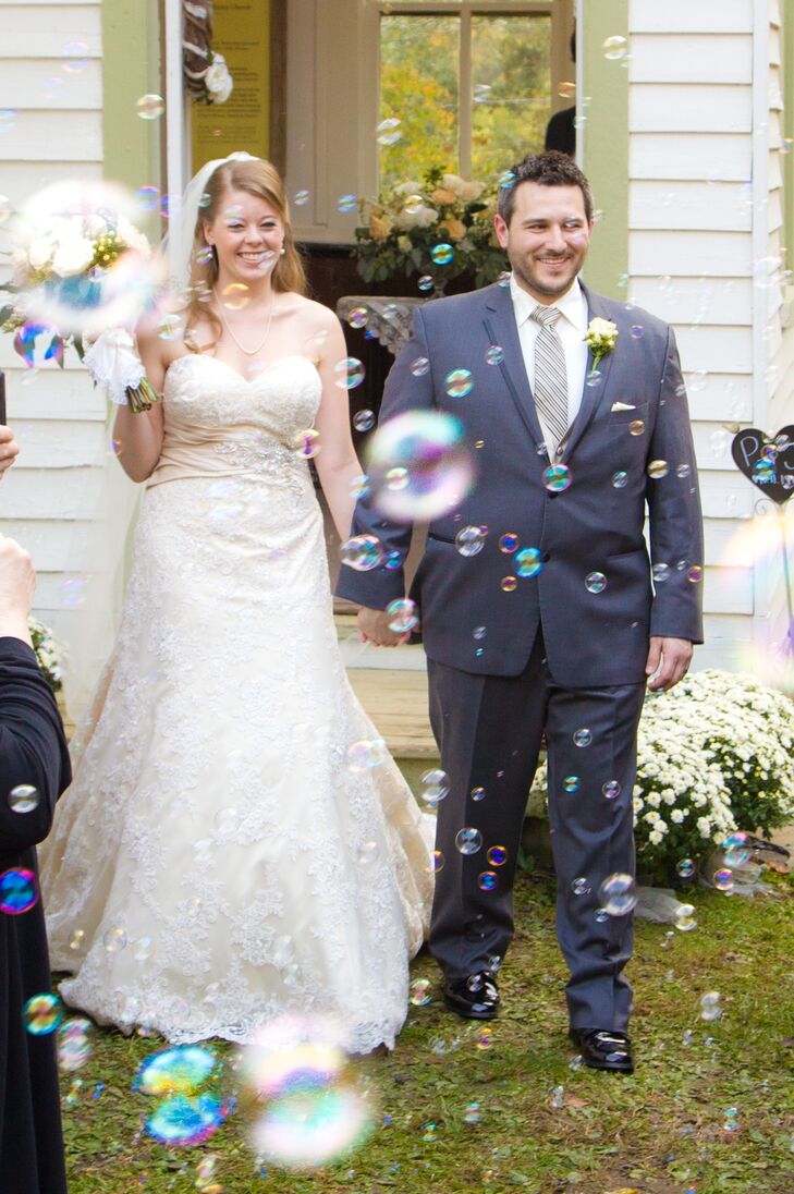 Guests blew bubbles at the newlyweds after the ceremony at John Wesley Church in Waterford, Virginia.