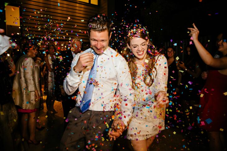At the end of the evening, Kate and Jordan’s families and friends sent them off in style by tossing bright, colorful confetti on them as they made their way to their getaway car.