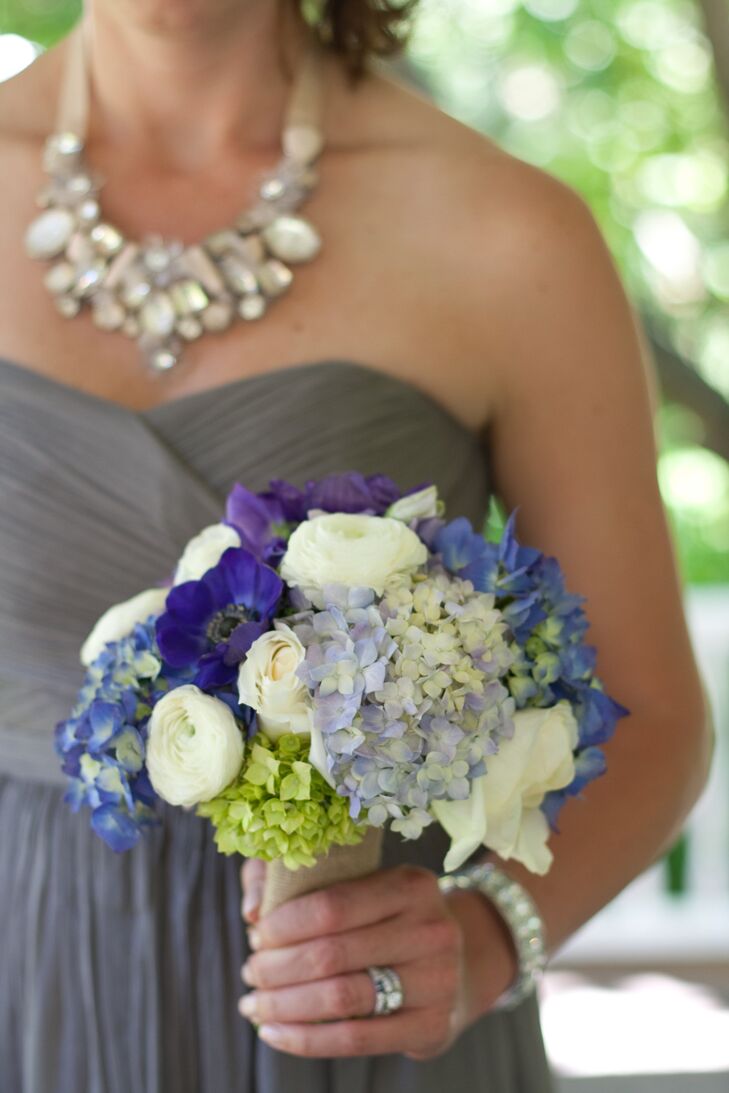 Bright purples and royal blues popped against creamy whites in Jen's bridesmaid bouquets.