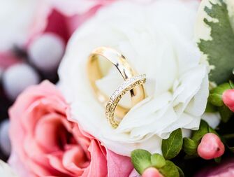 Wedding rings in flowers