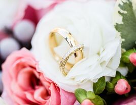 Wedding rings in flowers