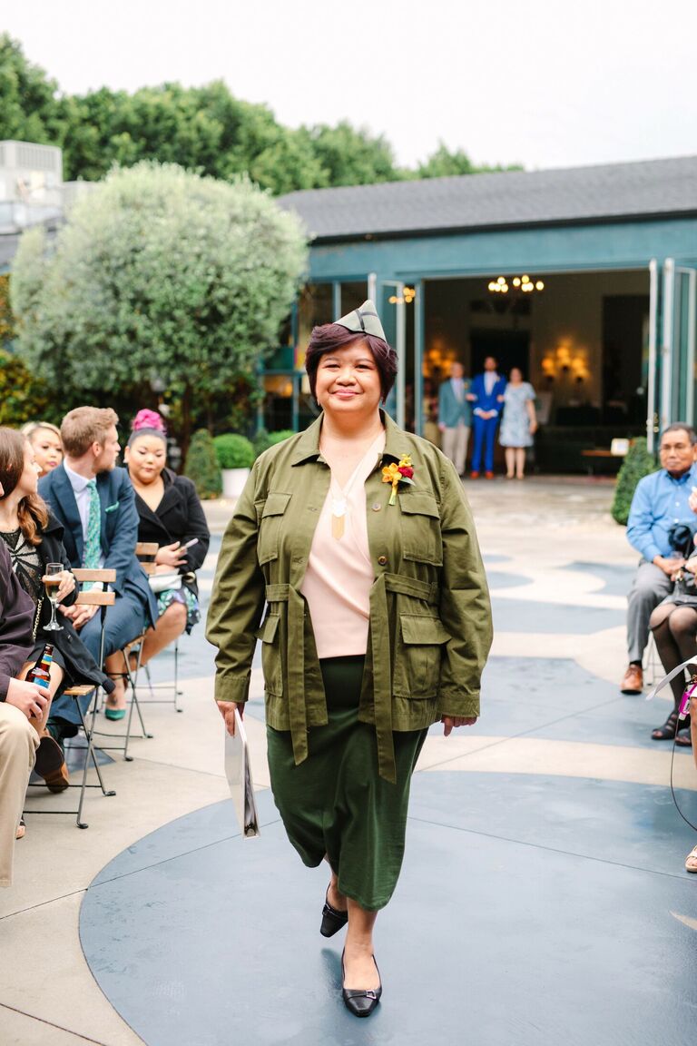 Wedding officiant dressed in green military-inspired attire