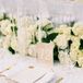 White Embroidered Table Linen, White Floral Runner and an Ornate Table Number