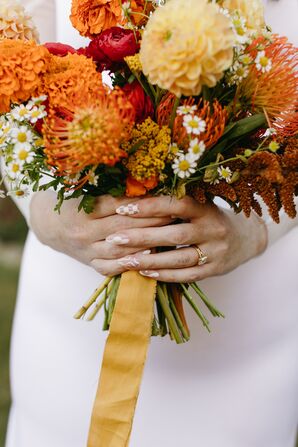 Bride With Unique White-and-Nude Nail Art Holding Bright Bouquet