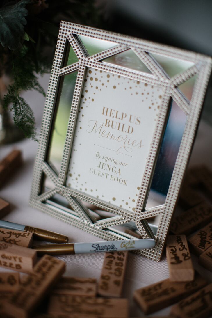 Instead of a traditional guest book, Nina and Tristan asked their guests to sign Jenga game pieces. "We liked the idea of having a keepsake game that had nice notes from our guests on them instead of a book that we might never look at again," Nina says.