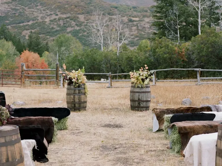 Wood Barrels Decorate the Altar for a Rustic Fall Wedding Ceremony